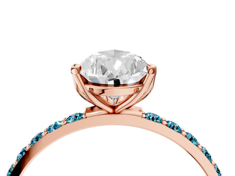Rose gold Pear Cut Diamond Solitaire Engagement Ring with Round with Blue Topaz side stone Pavé Band and Prong Setting_4