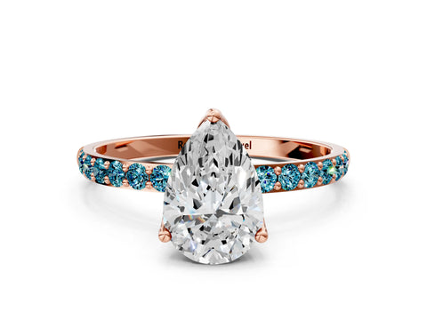 Rose gold Pear Cut Diamond Solitaire Engagement Ring with Round with Blue Topaz side stone Pavé Band and Prong Setting