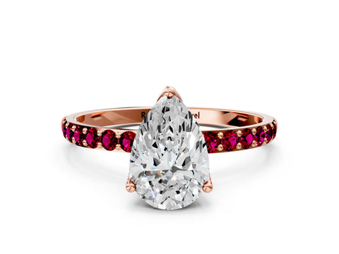 Rose gold Pear Cut Diamond Solitaire Engagement Ring with Round with Garnet side stone Pavé Band and Prong Setting