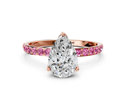 Rose gold Pear Cut Diamond Solitaire Engagement Ring with Round with Pink Sapphire side stone Pavé Band and Prong Setting