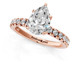Rose gold Pear Cut Diamond Solitaire Pavé Engagement Ring with Round Band and Prong Setting_75