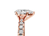 Rose gold Pear Cut Diamond Solitaire Pavé Engagement Ring with Round Band and Prong Setting_79