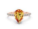 Rose gold Pear Cut Diamond Solitaire Ring with Four-Prong Setting and Pavé Band_12