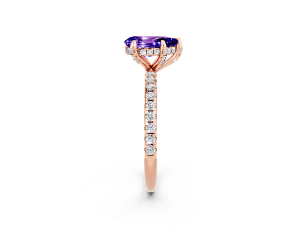 Rose gold Pear Cut Tanzanite Hidden Halo Engagement Ring with Round Pavé Band and Prong Setting