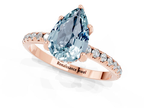 Rose gold Pear Cut Diamond Solitaire Ring with Four-Prong Setting and Pavé Band_1