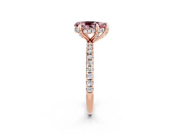 Rose gold Pear Cut Diamond Solitaire Ring with Four-Prong Setting and Pavé Band