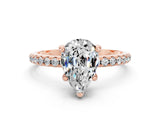Rose gold Pear Cut Diamond Solitaire Ring with Four-Prong Setting and Pavé Band
