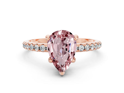 Rose gold Pear Cut Diamond Solitaire Ring with Four-Prong Setting and Pavé Band