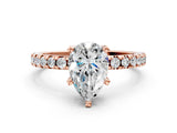 Rose gold Pear Cut Diamond Solitaire Ring with Pavé Band and Four-Prong Setting