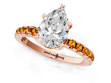 Rose gold Pear Cut Diamond Solitaire Ring with Pavé Band and Four-Prong Setting_1