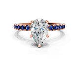 Rose gold Pear Cut Diamond Solitaire Ring with Pavé Band and Four-Prong Setting