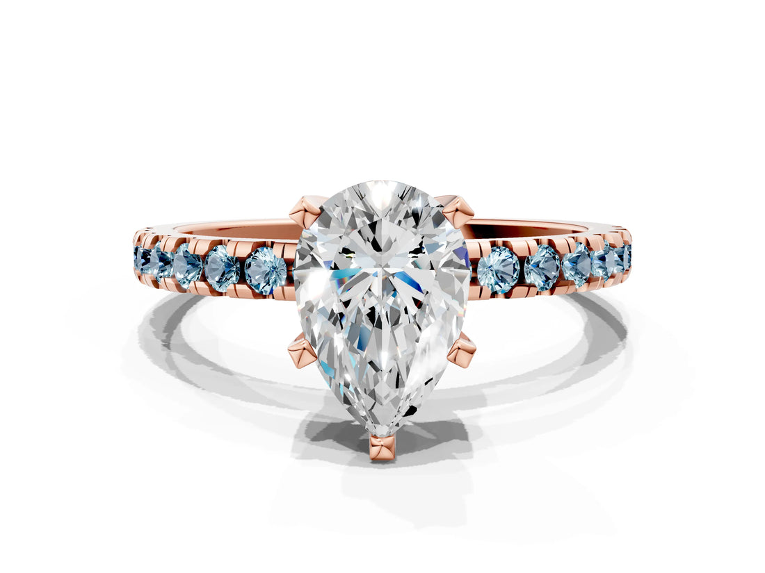 Rose gold Pear Cut Diamond Solitaire Ring with Pavé Band and Four-Prong Setting