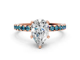Rose gold Pear Cut Diamond Solitaire Ring with Pavé Band and Four-Prong Setting
