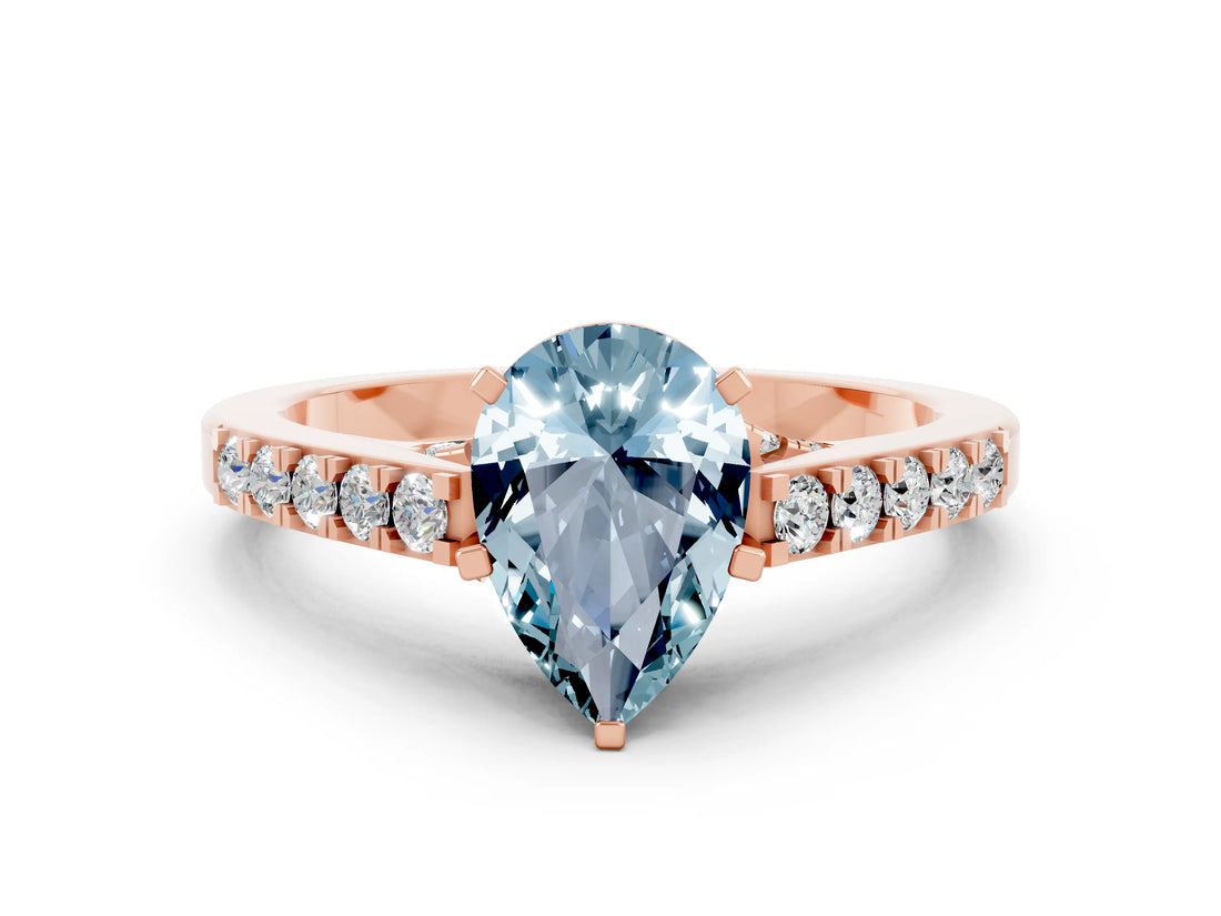 Rose gold Pear Cut Diamond Solitaire Ring with Pavé Band and Prong Setting