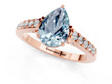Rose gold Pear Cut Diamond Solitaire Ring with Pavé Band and Prong Setting_1