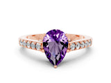 Rose gold Pear Cut Diamond Solitaire Ring with Pavé Band and Prong Setting