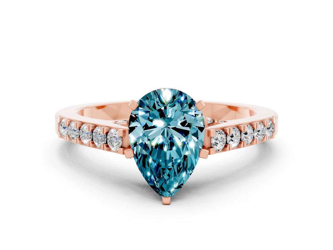 Rose gold Pear Cut Diamond Solitaire Ring with Pavé Band and Prong Setting