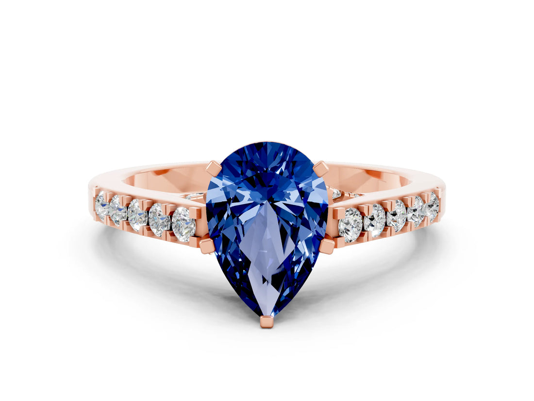 Rose gold Pear Cut Diamond Solitaire Ring with Pavé Band and Prong Setting