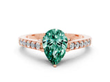 Rose gold Pear Cut Diamond Solitaire Ring with Pavé Band and Prong Setting