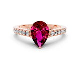 Rose gold Pear Cut Diamond Solitaire Ring with Pavé Band and Prong Setting