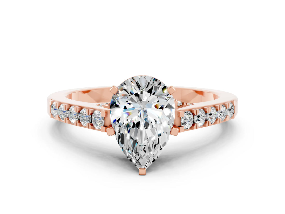 Rose gold Pear Cut Diamond Solitaire Ring with Pavé Band and Prong Setting