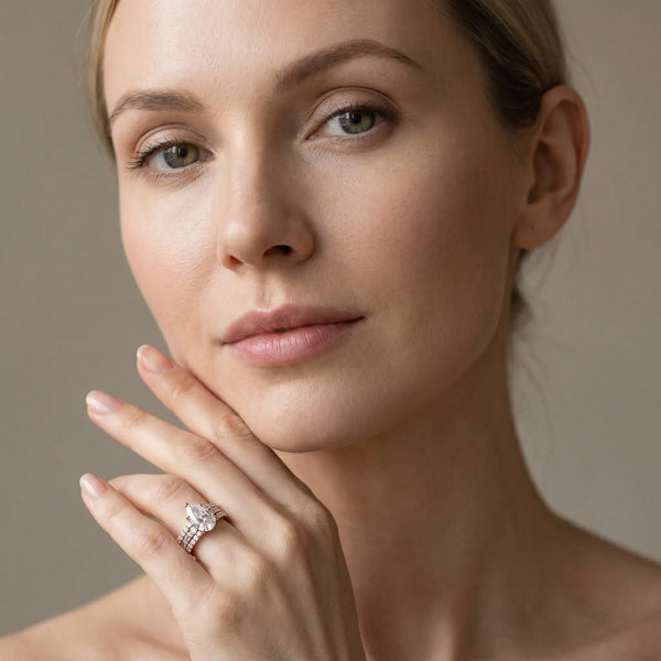 Rose gold Pear Cut Diamond Solitaire Ring with Pavé and Channel Set Band