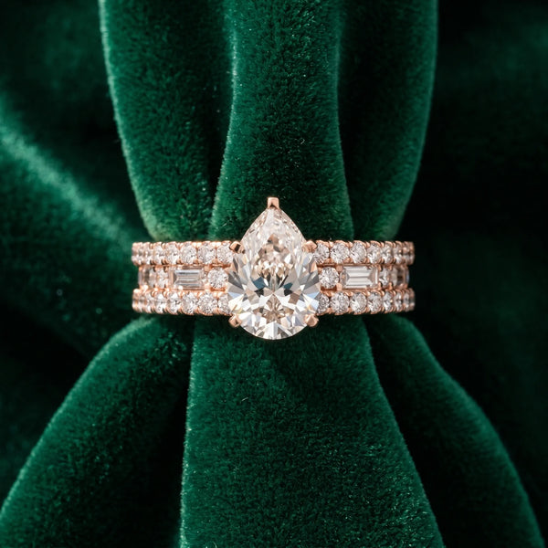 Rose gold Pear Cut Diamond Solitaire Ring with Pavé and Channel Set Band