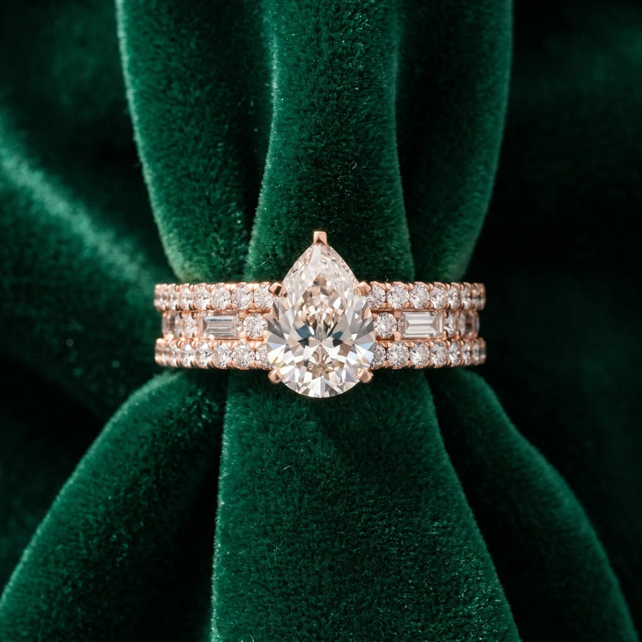 Rose gold Pear Cut Diamond Solitaire Ring with Pavé and Channel Set Band