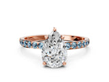 Rose gold Pear Cut Diamond Solitaire Ring with Round with Aquamarine side stone Pavé Band and Prong Setting_24