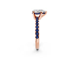 Rose gold Pear Cut Diamond Solitaire Ring with Round with Blue Sapphire side stone Pavé Band and Four-Prong Setting_38