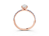Rose gold Pear Cut Diamond Solitaire Ring with Round with Blue Sapphire side stone Pavé Band and Prong Setting_15