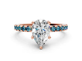 Rose gold Pear Cut Diamond Solitaire Ring with Round with Blue Topaz side stone Pavé Band and Four-Prong Setting_36