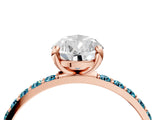 Rose gold Pear Cut Diamond Solitaire Ring with Round with Blue Topaz side stone Pavé Band and Prong Setting_16
