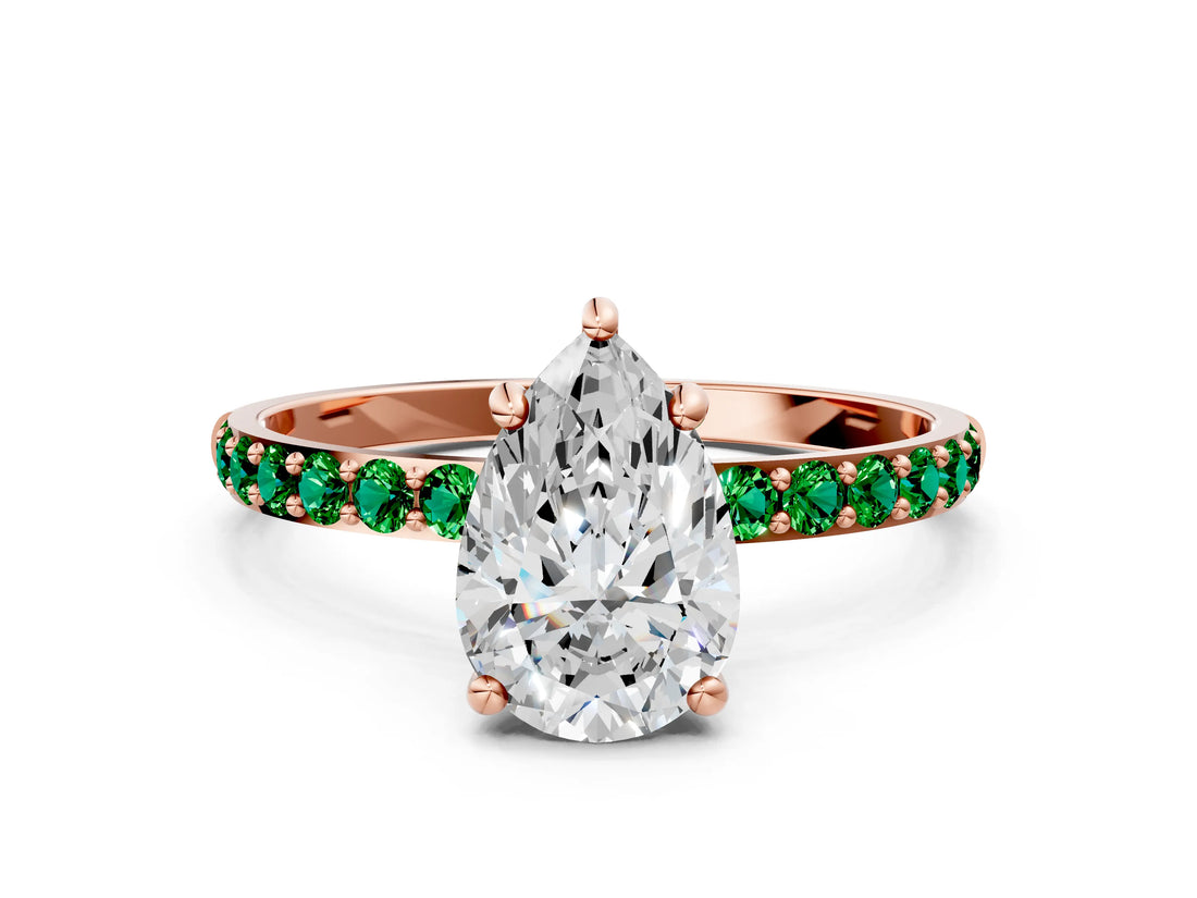 Rose gold Pear Cut Diamond Solitaire Ring with Round with Emerald side stone Pavé Band and Prong Setting_36
