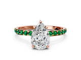 Rose gold Pear Cut Diamond Solitaire Ring with Round with Emerald side stone Pavé Band and Prong Setting_36