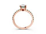 Rose gold Pear Cut Diamond Solitaire Ring with Round with Green Sapphire side stone Pavé Band and Four-Prong Setting_39