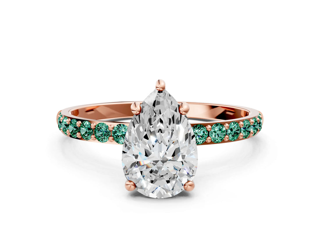 Rose gold Pear Cut Diamond Solitaire Ring with Round with Green Sapphire side stone Pavé Band and Prong Setting