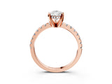 Rose gold Pear Cut Diamond Solitaire Ring with Round with Moissanite side stone Pavé Band and Four-Prong Setting_39