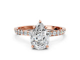 Rose gold Pear Cut Diamond Solitaire Ring with Round with Moissanite side stone Pavé Band and Prong Setting_12