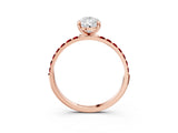 Rose gold Pear Cut Diamond Solitaire Ring with Round with Ruby side stone Pavé Band and Prong Setting_39