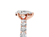Rose gold Pear Cut Diamond Solitaire Ring with Shared Prong Pavé Band and Four-Prong Setting_83