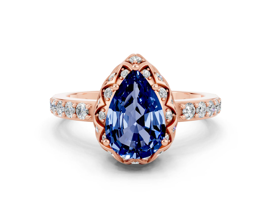 Rose gold Pear Cut Diamond Solitaire Ring with Shared Prong Pavé Band