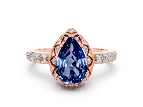 Rose gold Pear Cut Diamond Solitaire Ring with Shared Prong Pavé Band