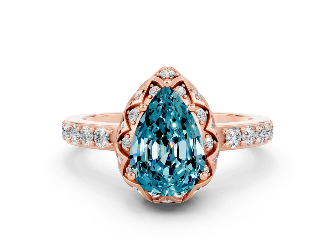 Rose gold Pear Cut Diamond Solitaire Ring with Shared Prong Pavé Band