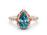 Rose gold Pear Cut Diamond Solitaire Ring with Shared Prong Pavé Band