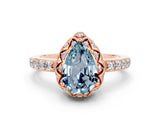 Rose gold Pear Cut Diamond Solitaire Ring with Shared Prong Pavé Band