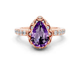 Rose gold Pear Cut Diamond Solitaire Ring with Shared Prong Pavé Band