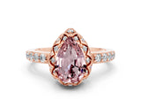 Rose gold Pear Cut Diamond Solitaire Ring with Shared Prong Pavé Band