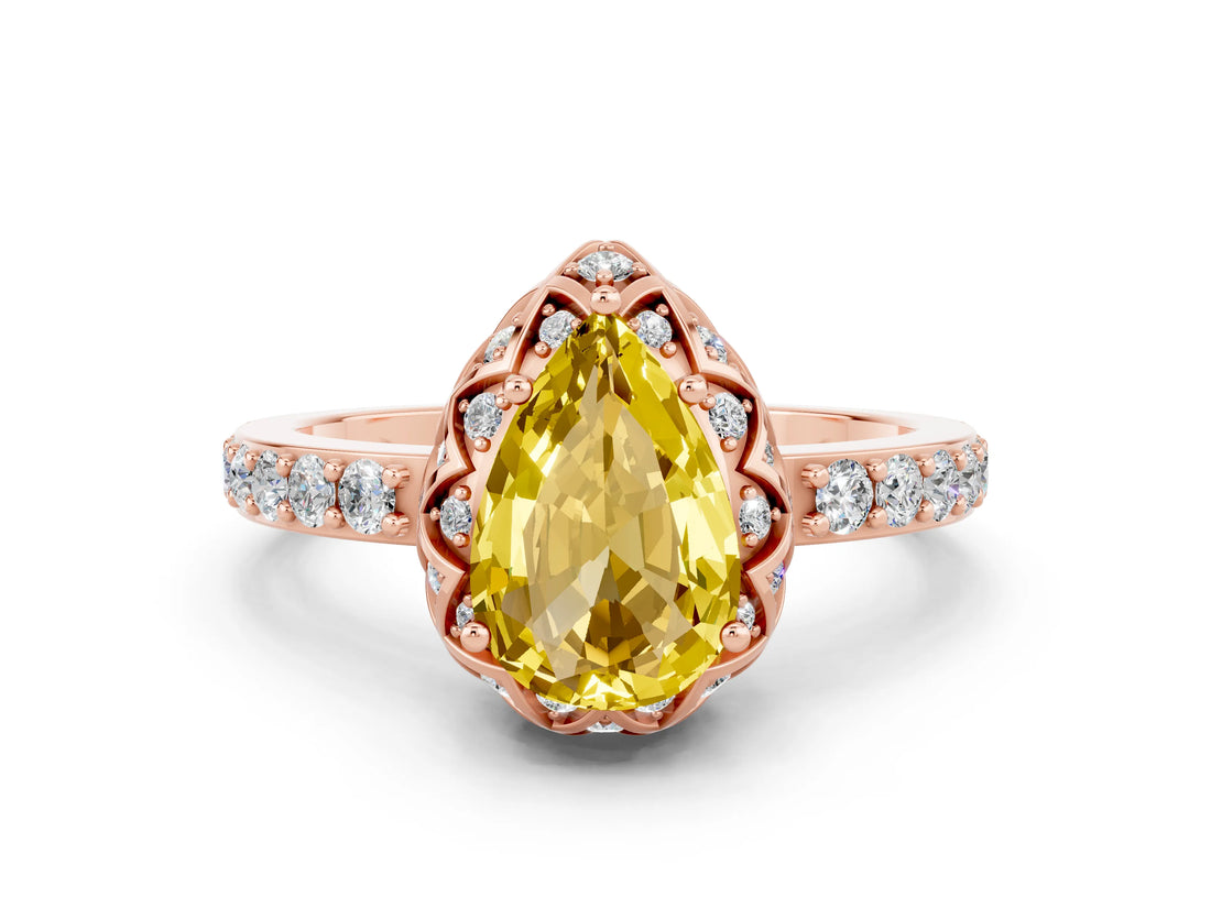 Rose gold Pear Cut Diamond Solitaire Ring with Shared Prong Pavé Band
