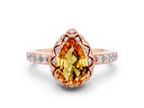 Rose gold Pear Cut Diamond Solitaire Ring with Shared Prong Pavé Band
